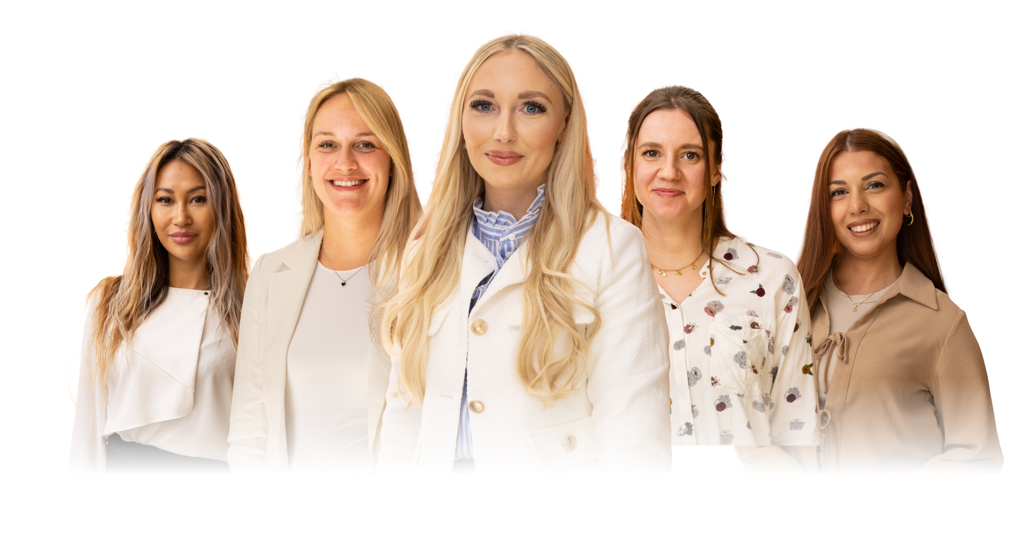 5 women doctors standing and smiling