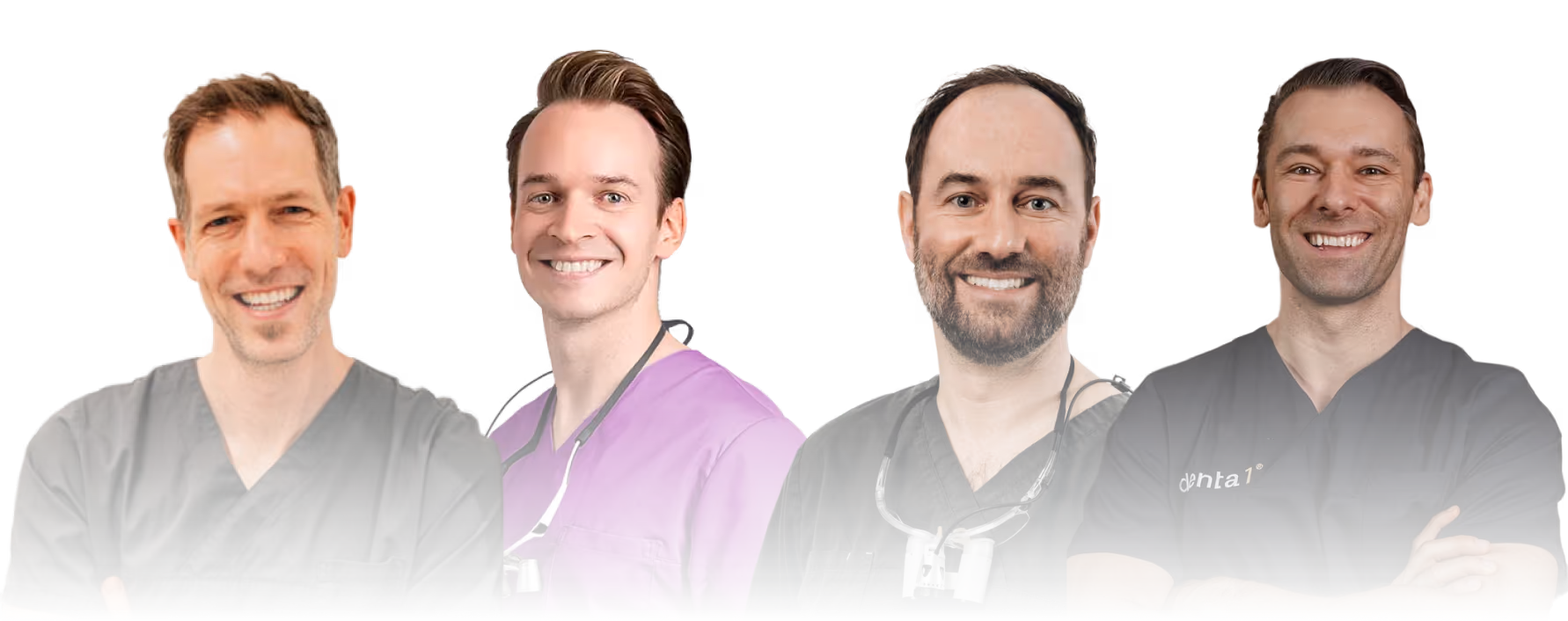 four doctors smiling and looking in the camera