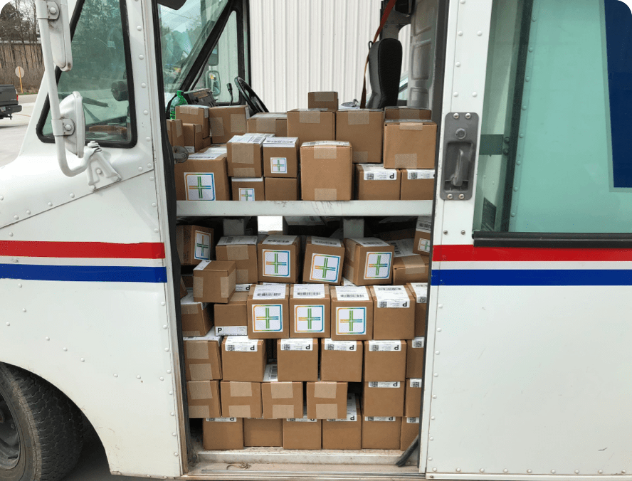 boxes filling up USPS vans