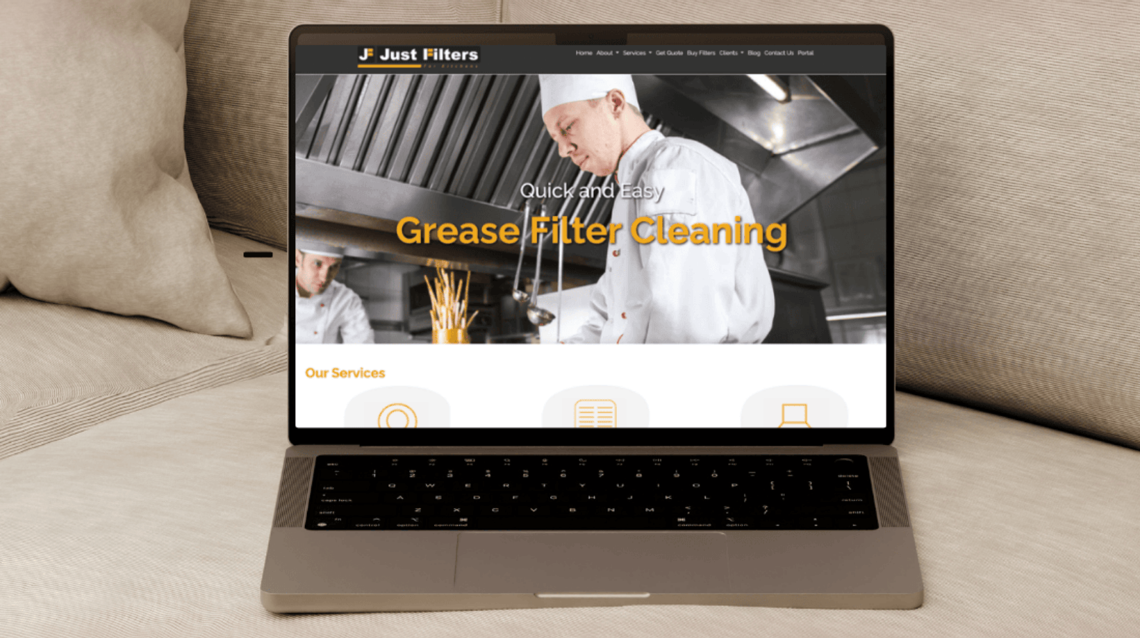Just Filters website displayed on a laptop screen, highlighting digital presence and service information.