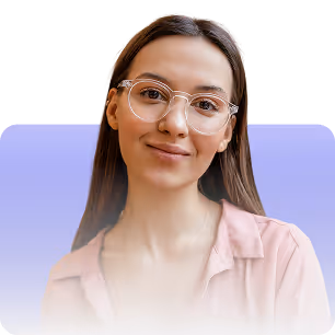 Young woman with long brown hair wearing glasses and a light pink blouse, smiling gently against a light purple background.