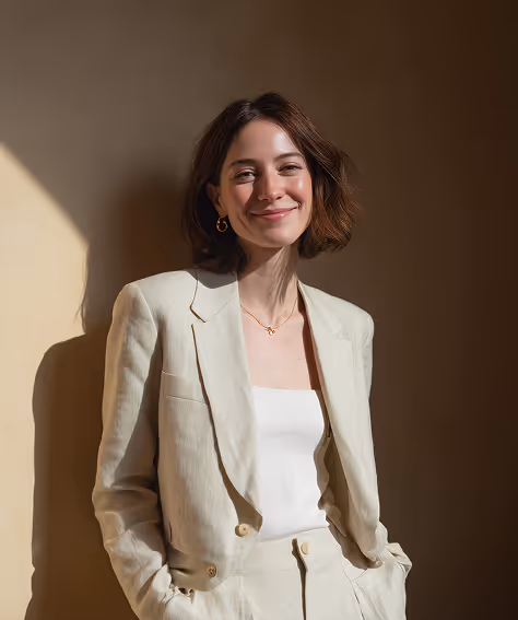 A professionally dressed woman representing trust, expertise, and strong leadership in architectural project management.