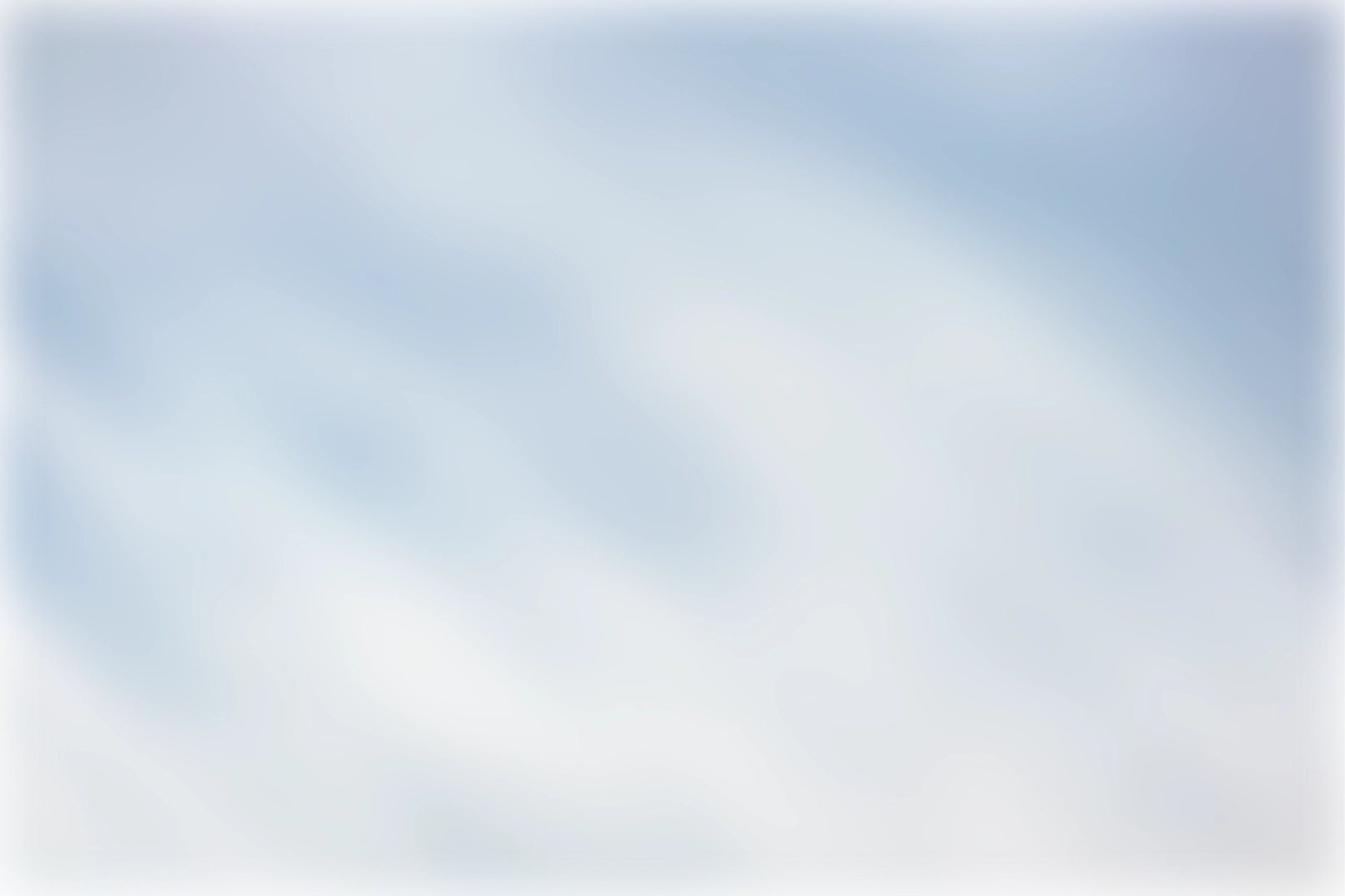 Soft blue and white gradient background with a frosty, blurred texture.