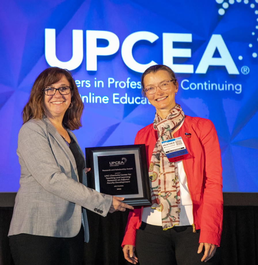 Presenting an award at a UPCEA event