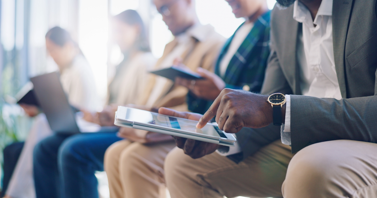 professional using tablet at event