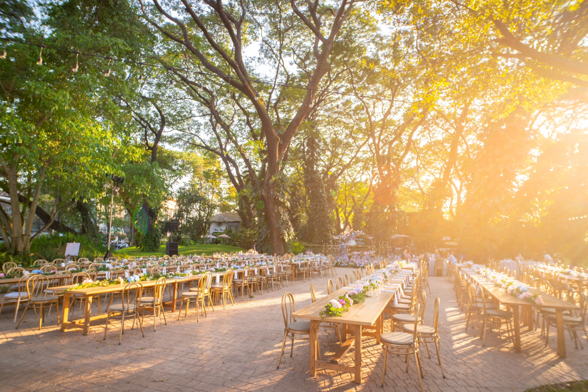 outdoor event venue with dining tables and chairs