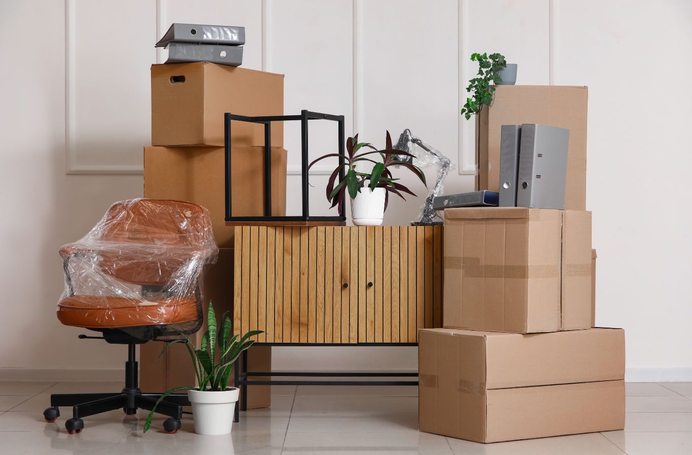 Minute Men Movers professional carefully handling furniture during relocation in Bloomington with precision and control. Moving Company Near Me