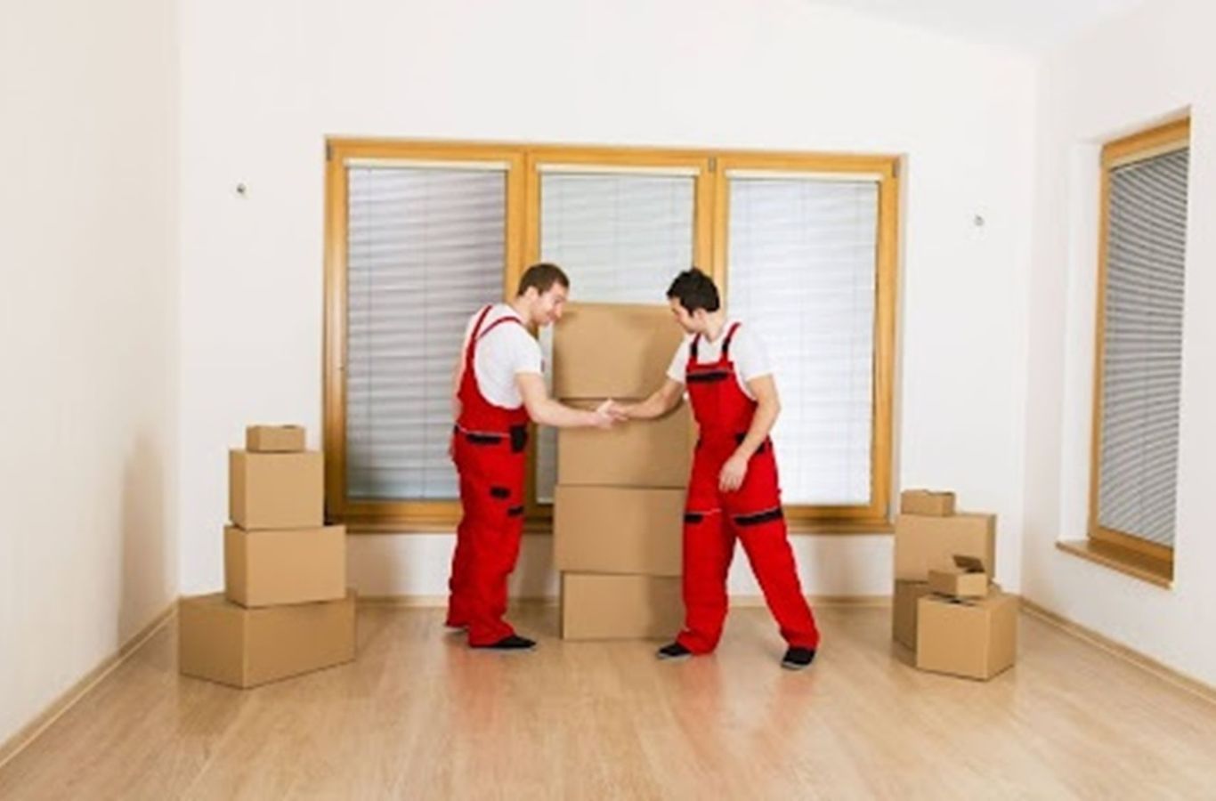 Minute Men Movers crew packing and organizing items during a moving company job in Saint Paul with efficient workflow