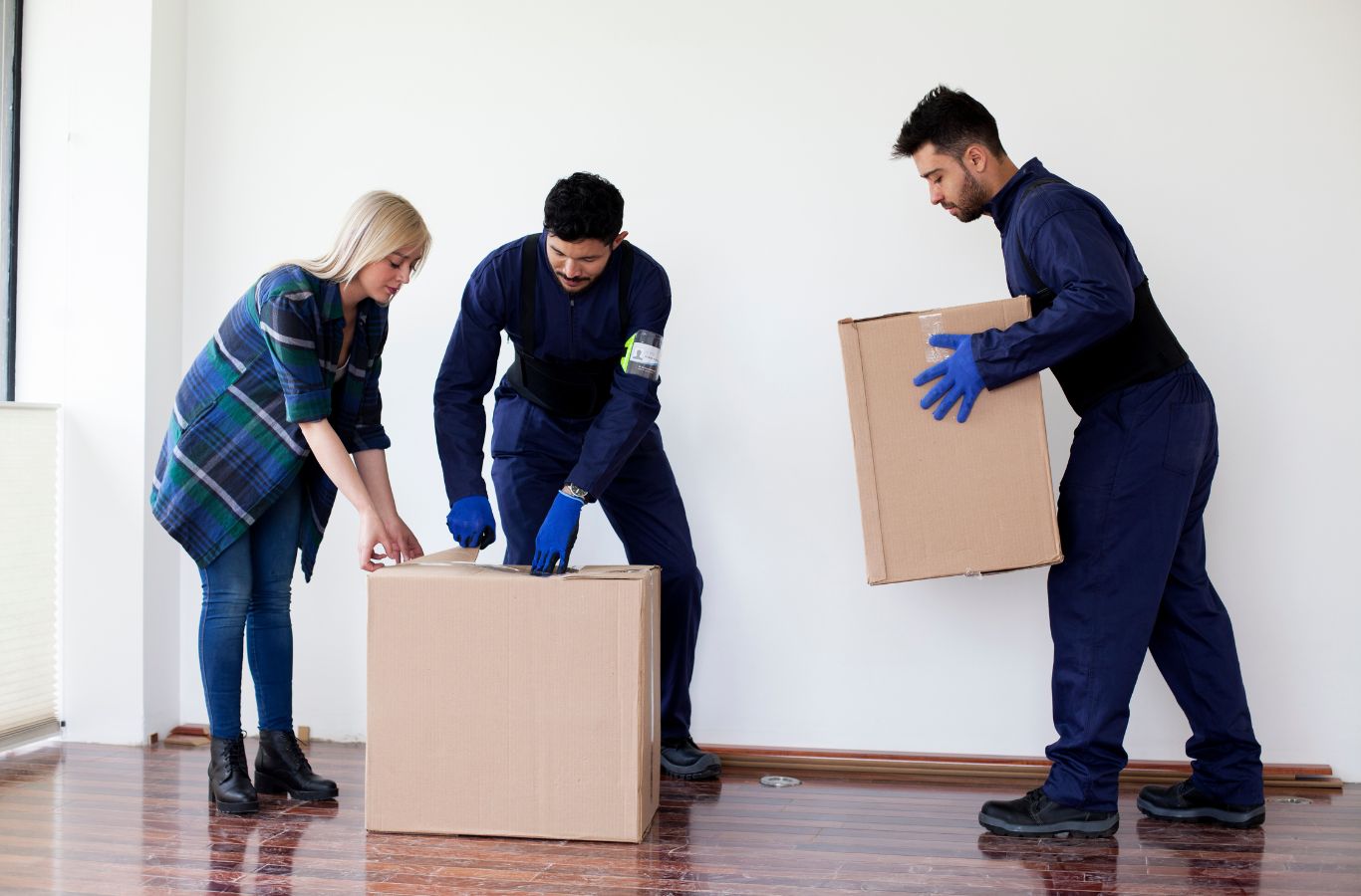 Minute Men Movers professional safely handling furniture during relocation in Ramsey County with precision and care. Moving Company Near Me
