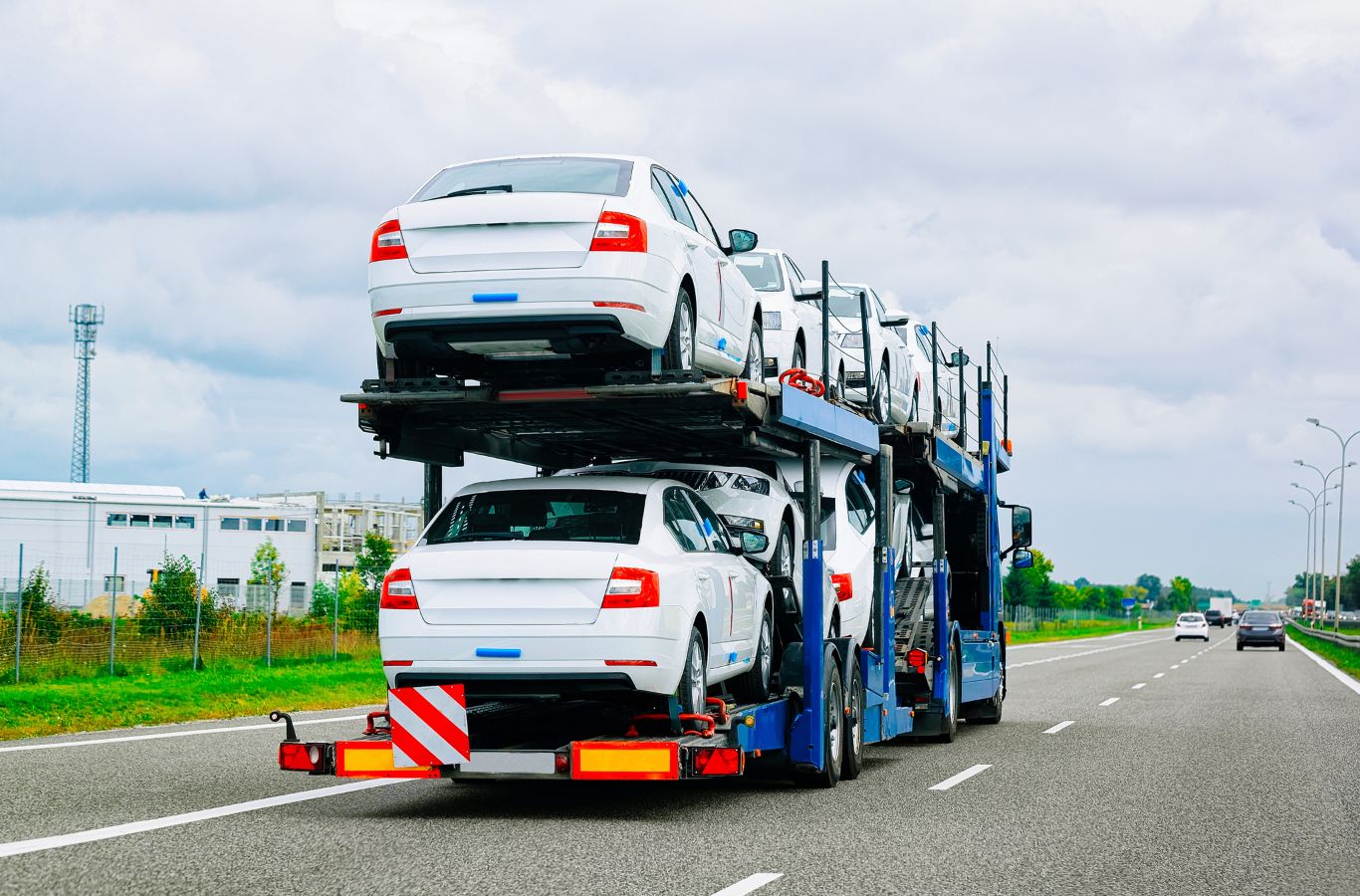 Minute Men Movers specialist preparing a vehicle for transport in Minnetonka, MN with reliable relocation services. Vehicle Transport Near Me.