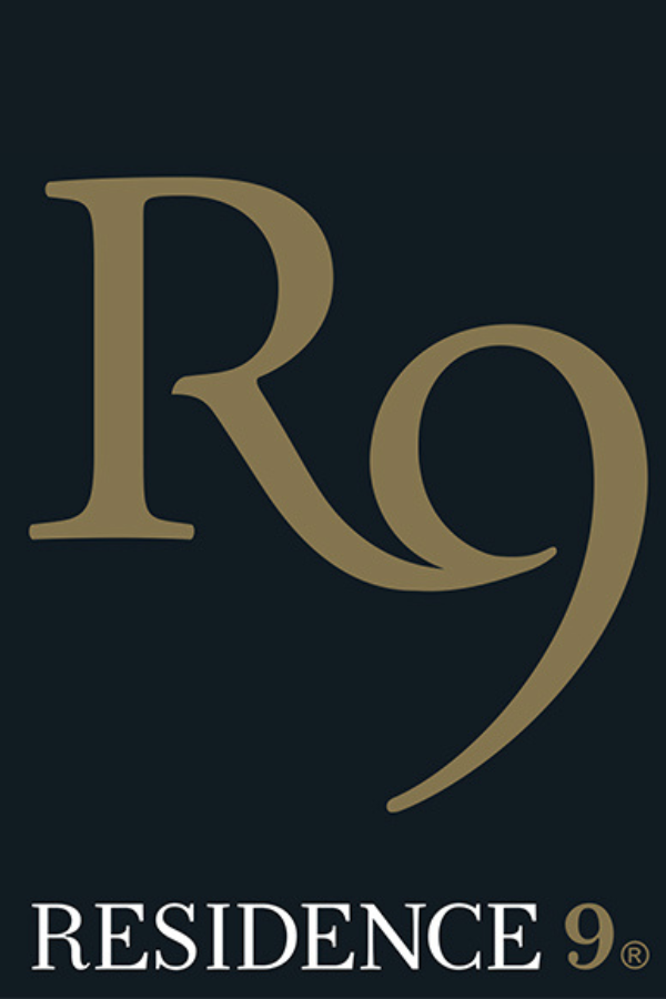 Logo with stylized letters 'R9' in gold above the text 'RESIDENCE 9' on a dark background.