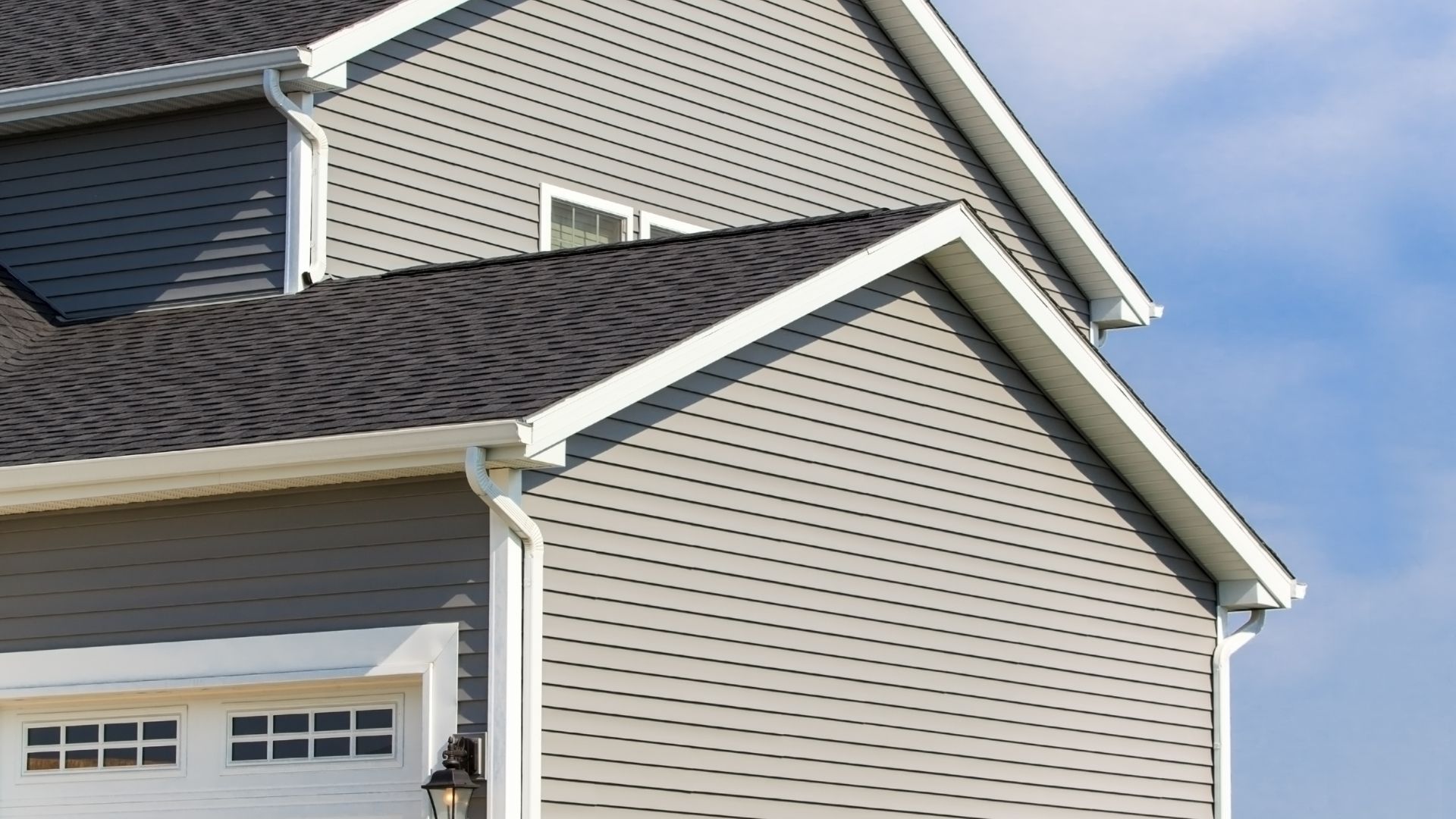 A downspout effectively channeling rainwater away from a home's foundation.