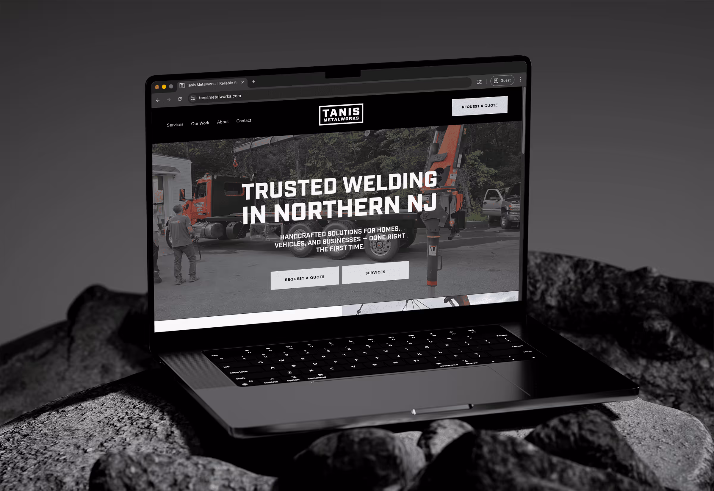 Laptop displaying Tanis Metalworks website homepage with a banner reading 'Trusted Welding in Northern NJ' and buttons for requesting quotes and services.