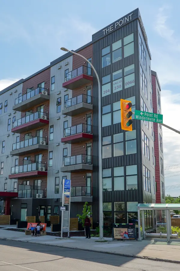 The Point at 1125 Pembina Highway, Winnipeg, a six-storey mixed-use building at the corner transit stop