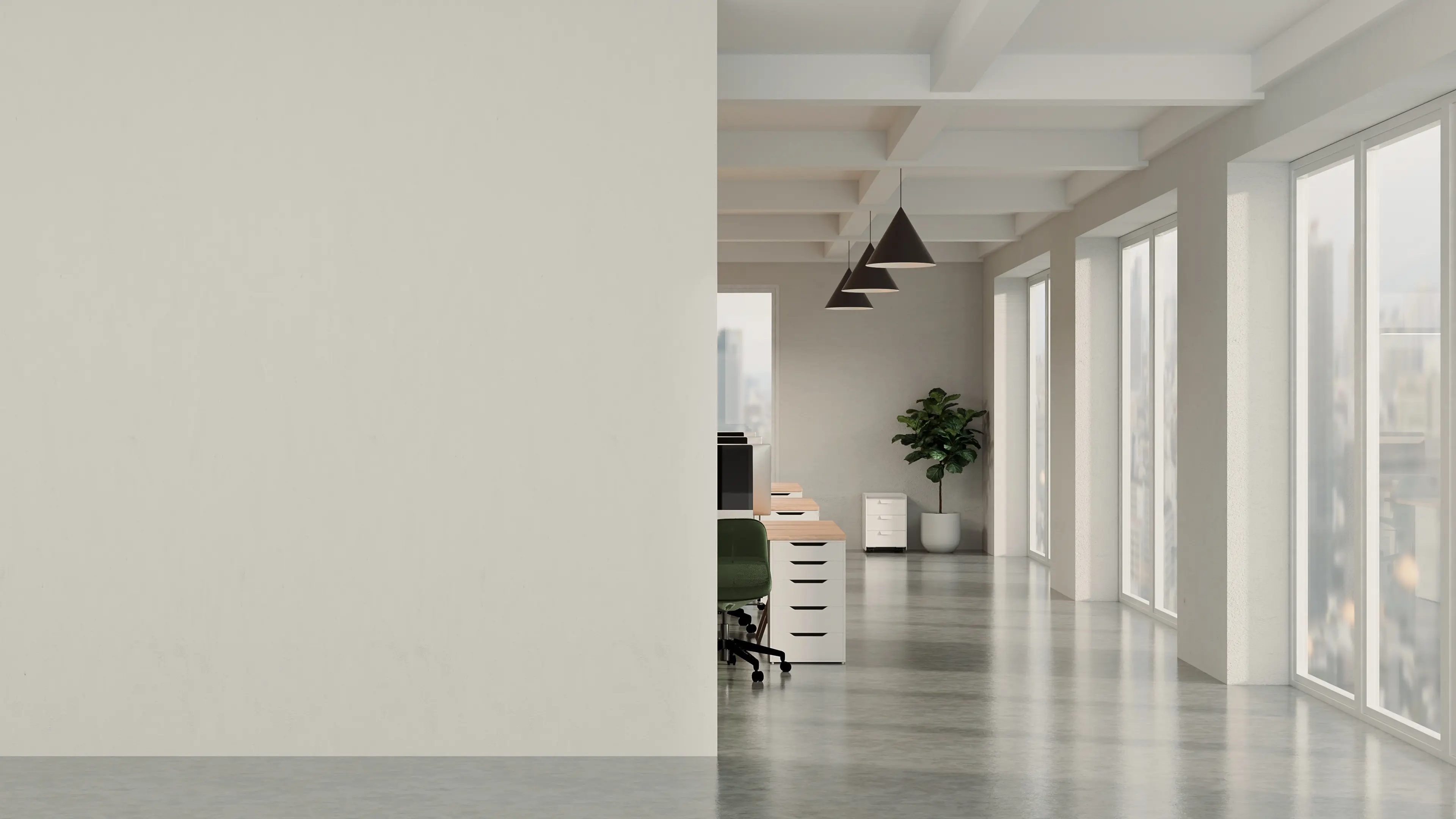 Smooth Level 5 drywall wall in a bright open-plan office with daylight raking across the surface
