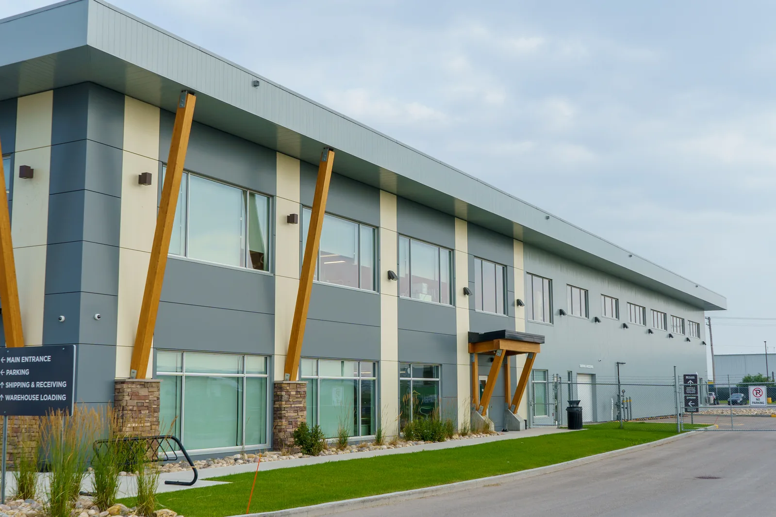 570 Rue Camiel Sys Street in Winnipeg with angled timber columns along the facade