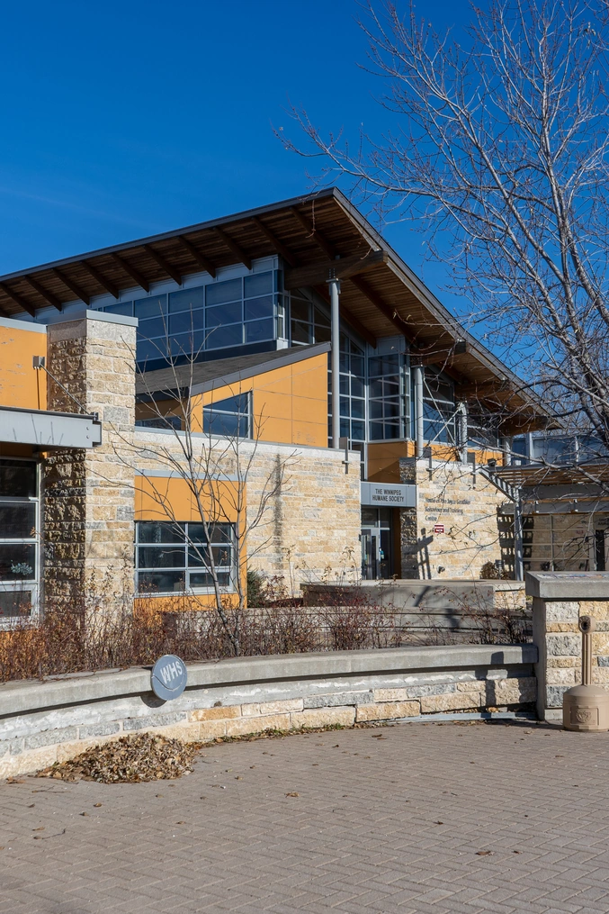 Entrance to the Winnipeg Humane Society, timber and stone with a glazed upper storey