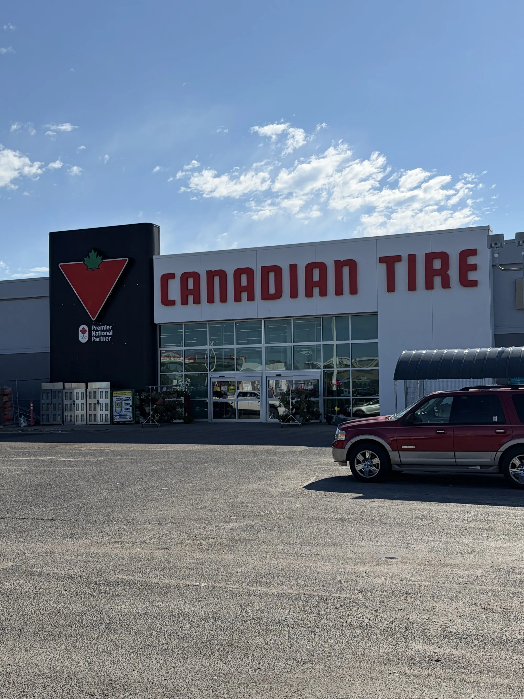 Canadian Tire storefront in Winnipeg with the glazed main entrance