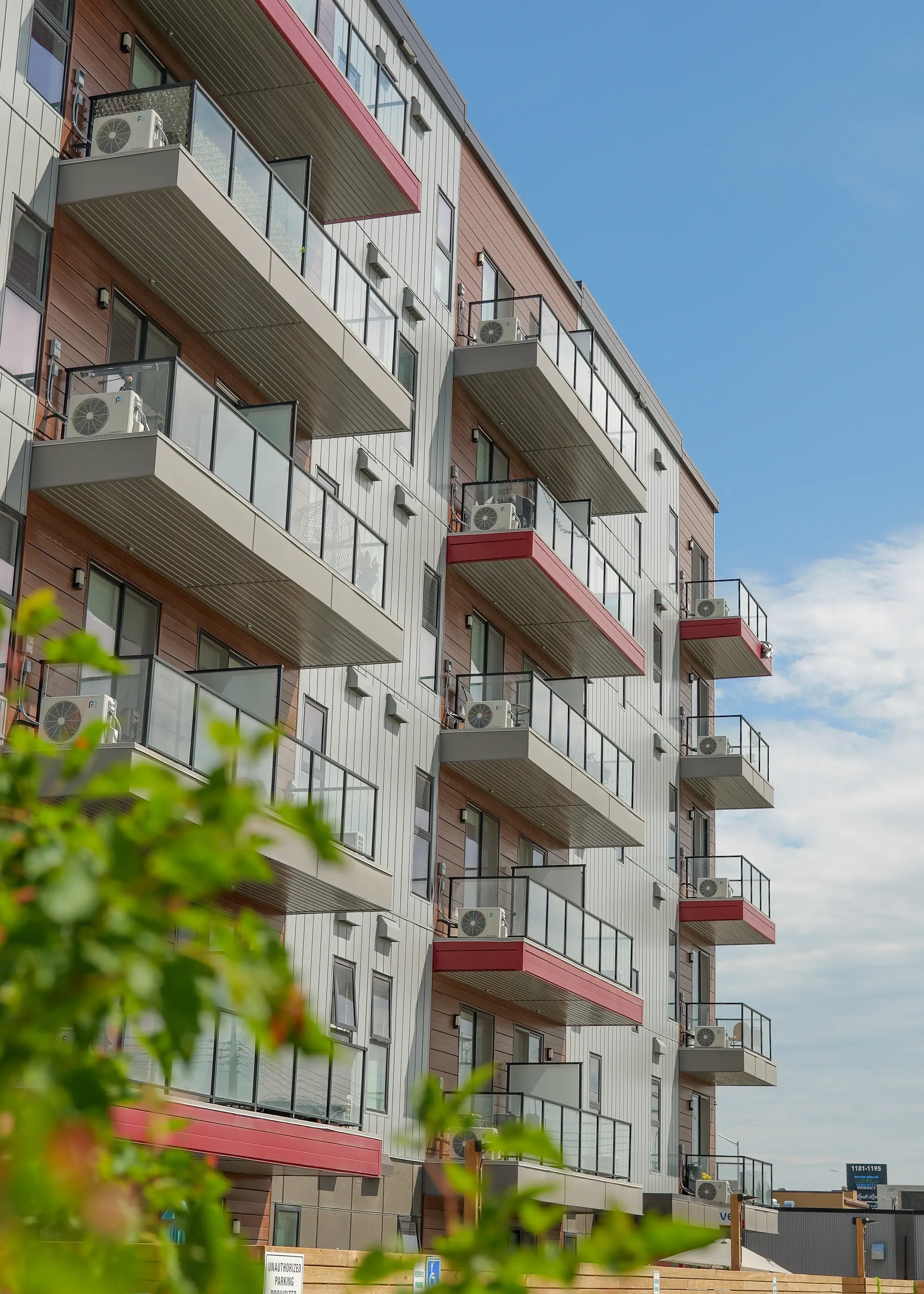 Balconies and red accent panels on The Point at 1125 Pembina Highway in Winnipeg
