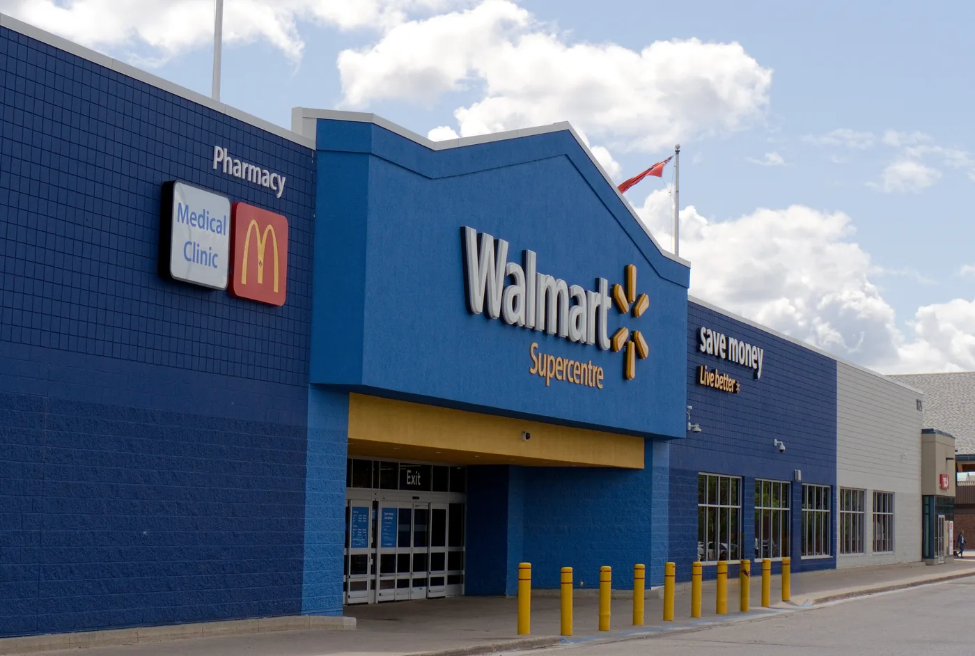 Entrance and pharmacy signage at the Walmart Supercentre in Winnipeg