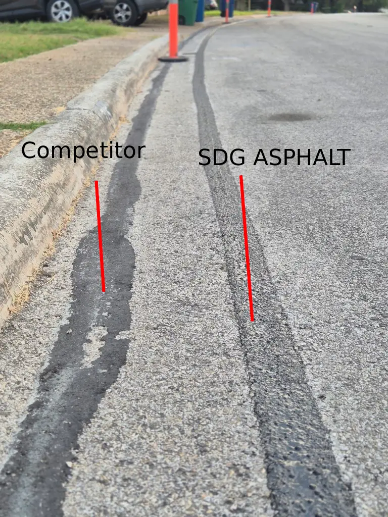 Close-up of two asphalt repair lines on a street; the left labeled 'Competitor' is uneven and patchy, while the right labeled 'SDG ASPHALT' is smoother and more consistent.