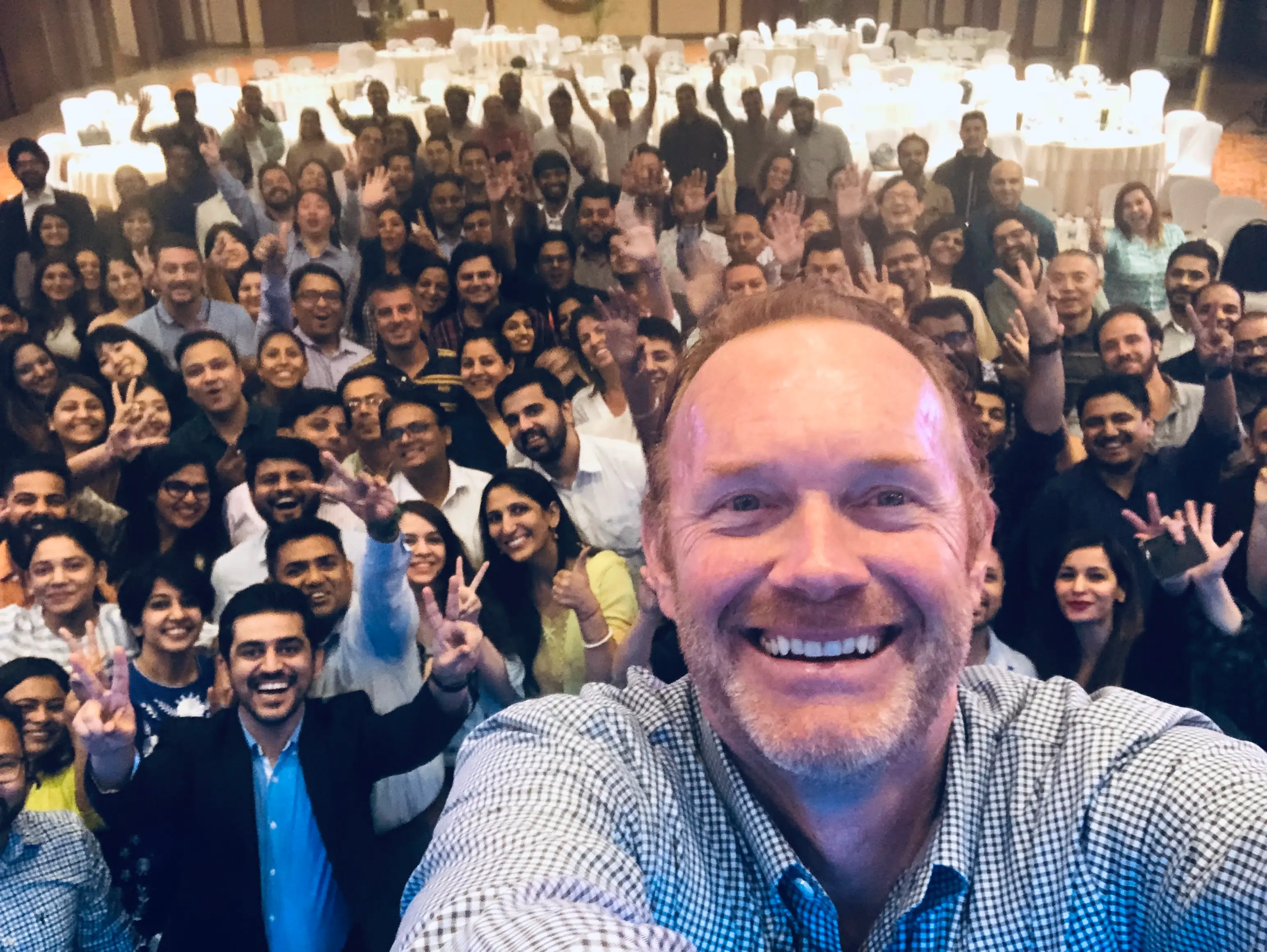 John Smiling With People