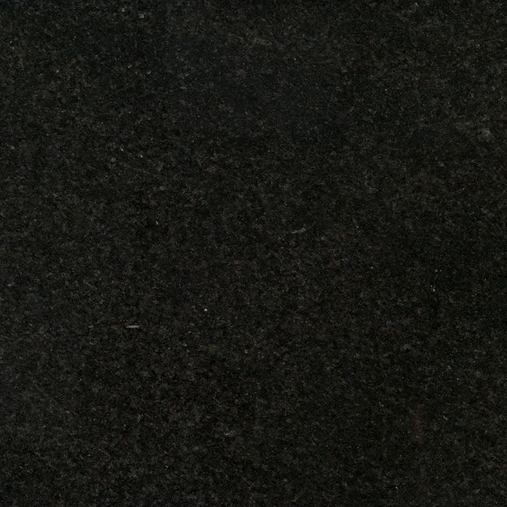 This may contain: a black granite counter top that is very dark
