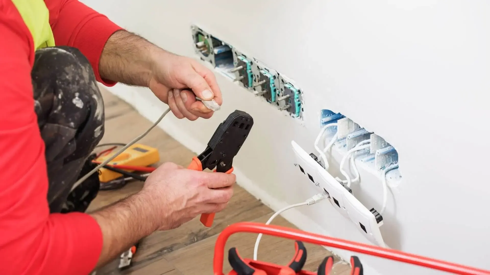 Licensed electrician performing residential electrical panel upgrade in Dallas