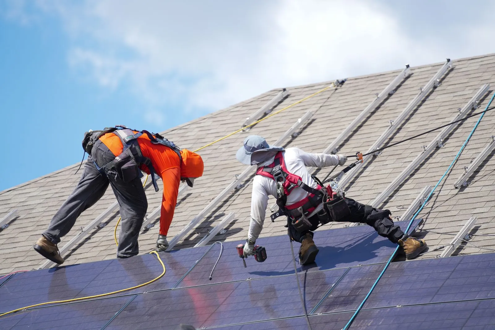Solar detach and reset contractors removing panels for a roof replacement in North Texas