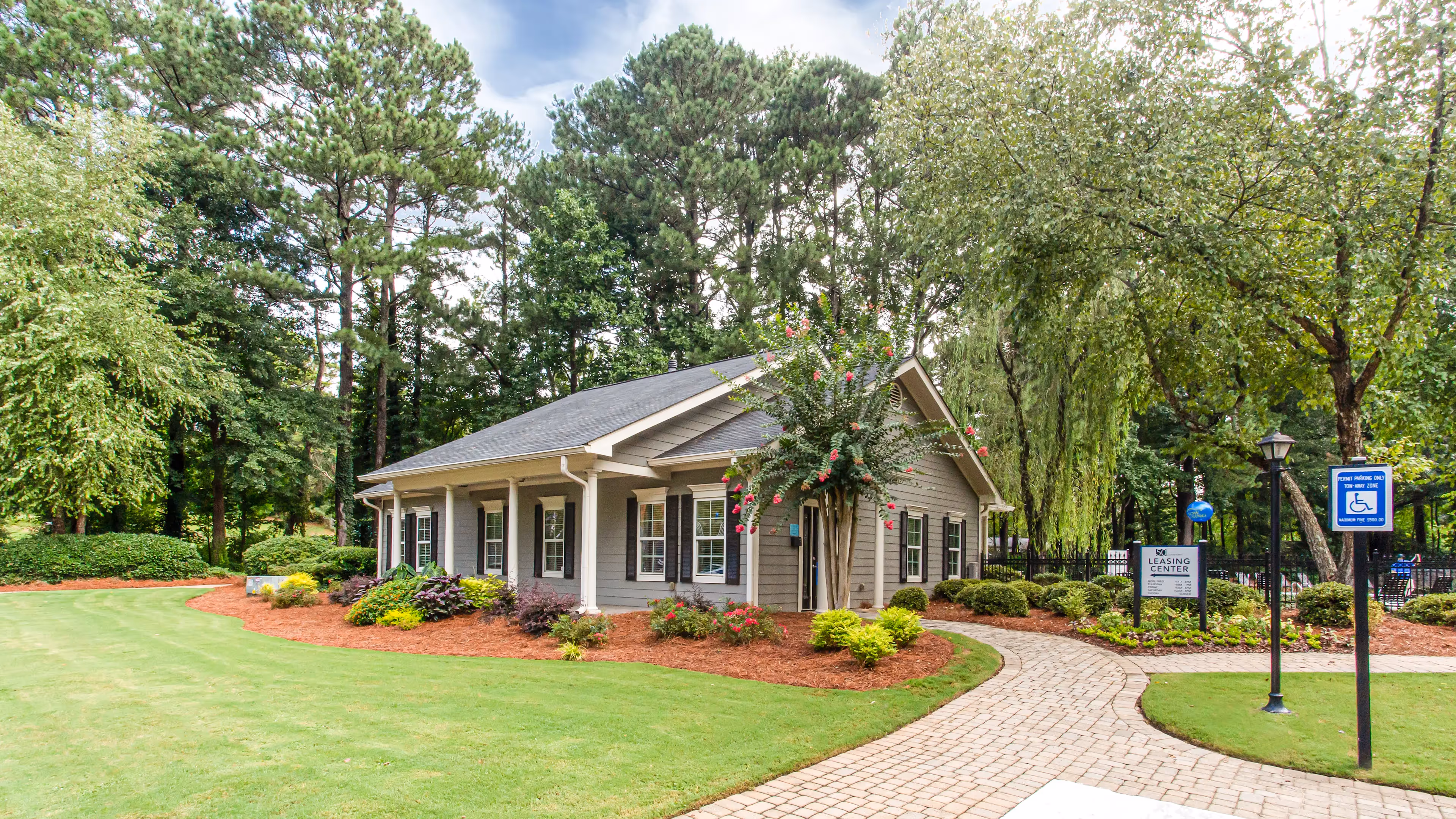 Leasing office with trees and flowers