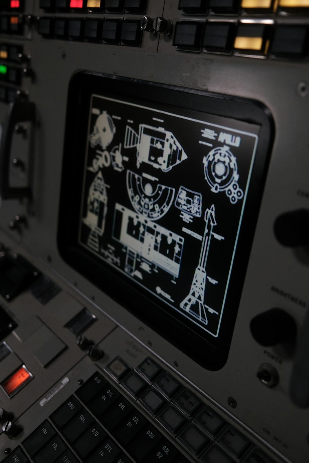 The control panel of a plane with a lot of buttons