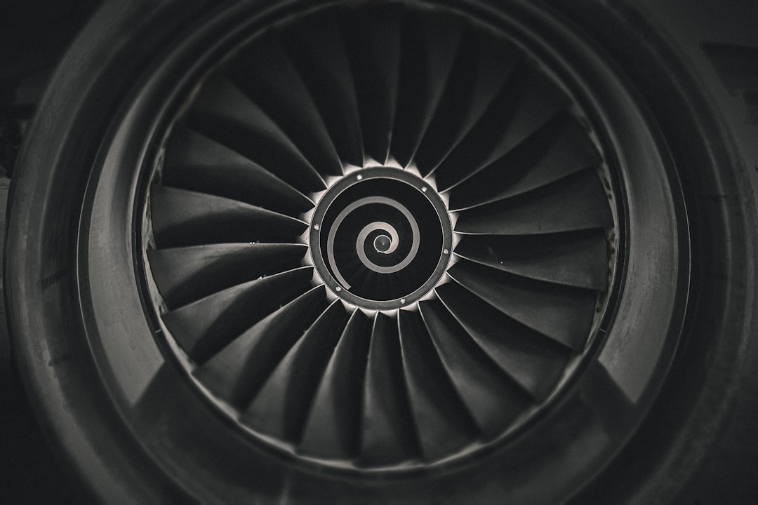 a black and white photo of a jet engine