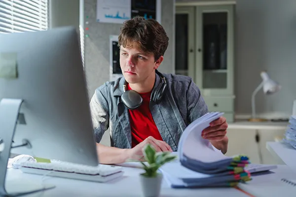 student in front of computer