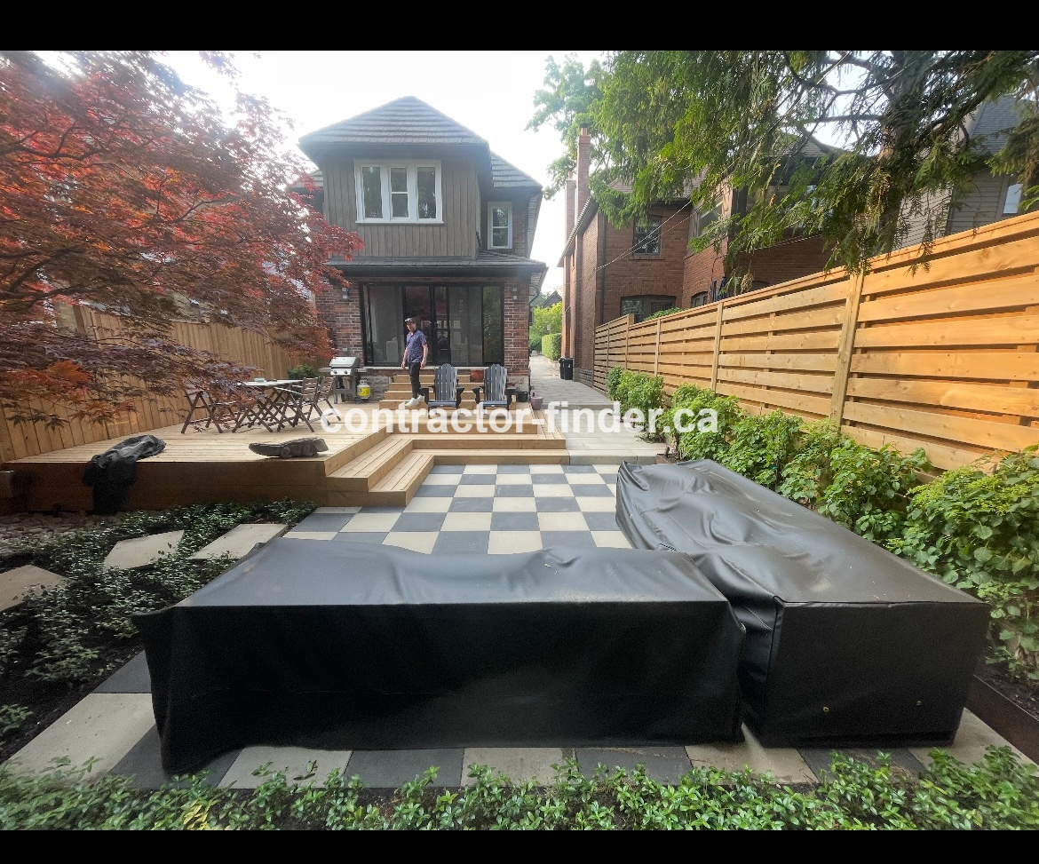Two-level custom deck with landscaping in Toronto featuring multi-tiered design and professional finishing