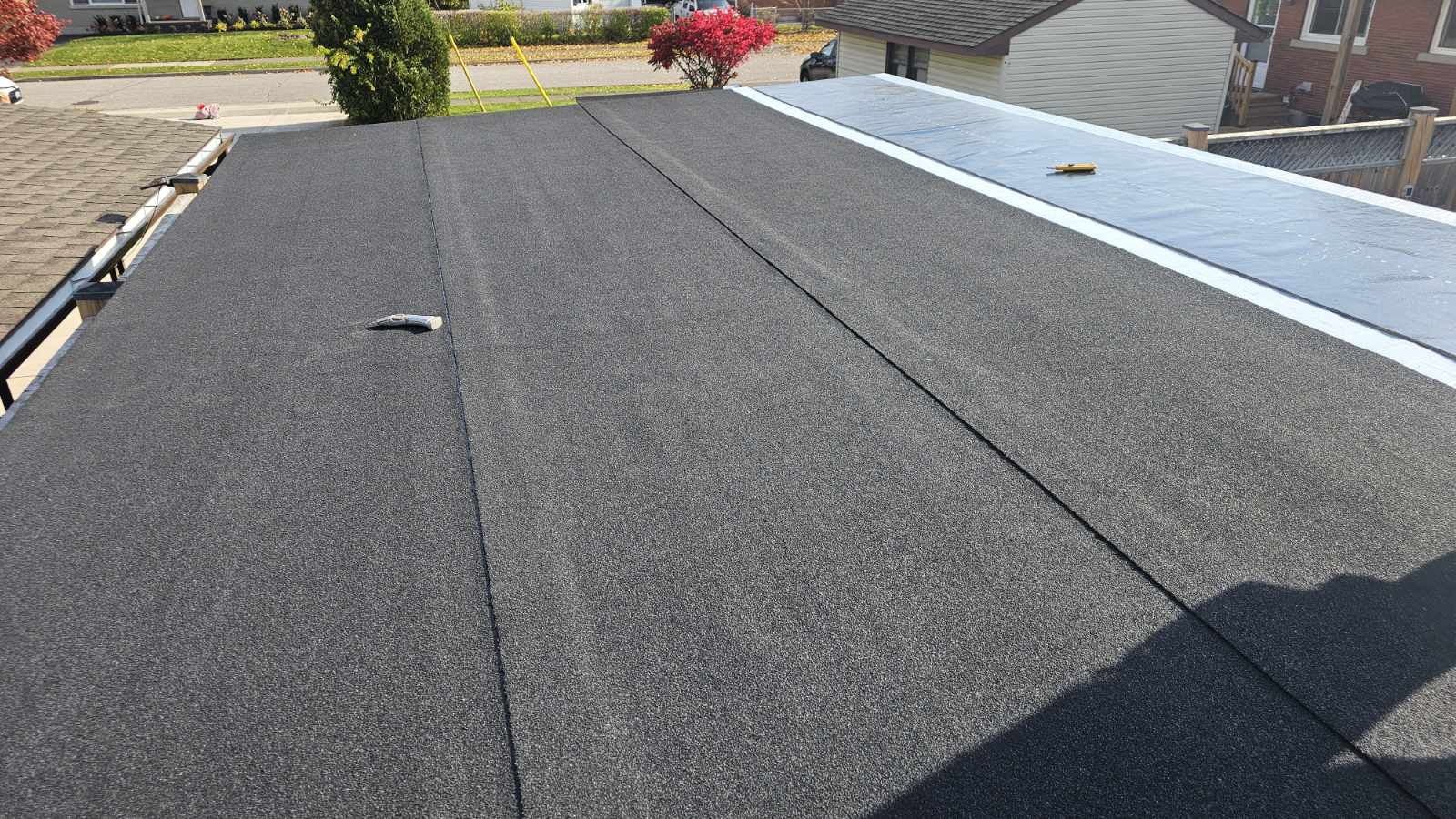 Flat roof installation project with professional waterproofing