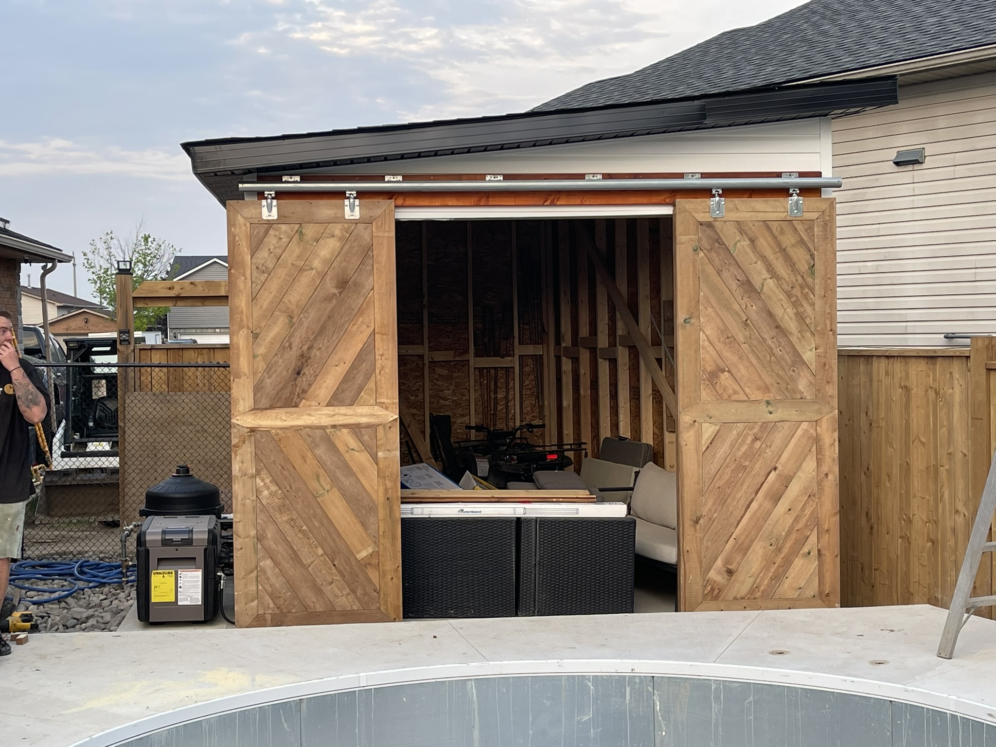 Custom outdoor structures including cabins, sheds, and jacuzzi covers with professional craftsmanship in Kitchener.