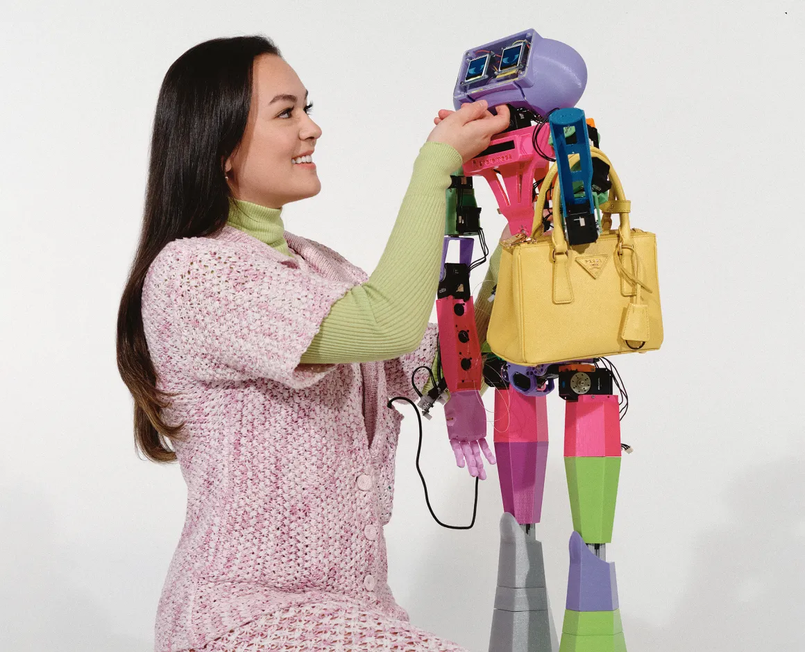 Grace Brown and Abi the companion robot