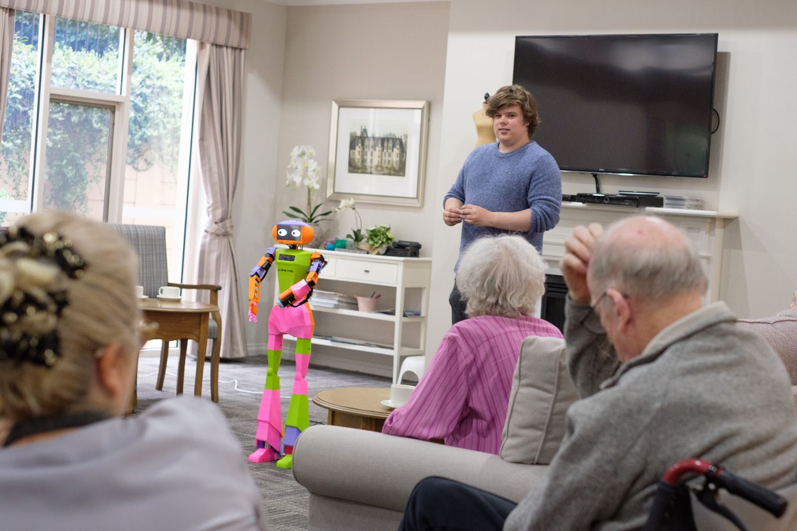 Abi the companion robot interacts with aged care residents and staff at MACG