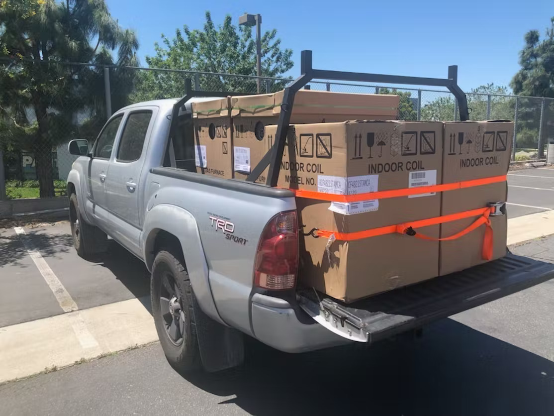 Image of a pickup truck loaded with boxes for a delivery