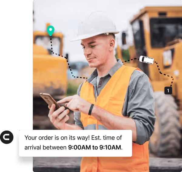 Construction worker checking delivery status on a mobile phone with real-time tracking and estimated time of arrival displayed.