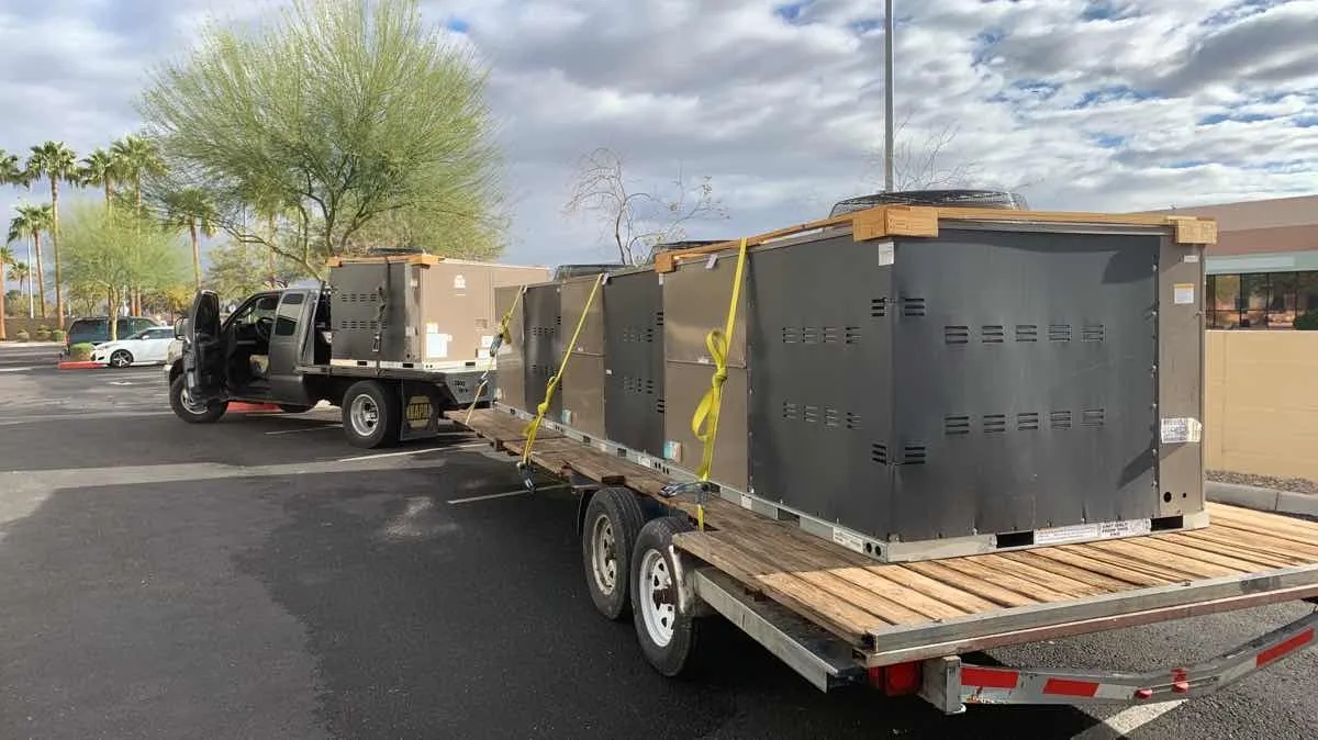 A Curri delivery of HVAC units during peak season on a trailer