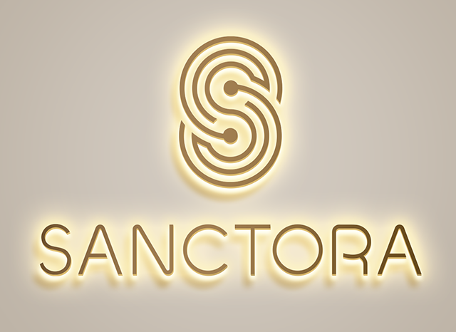 Illuminated Sanctora logo on a golden-beige wall.