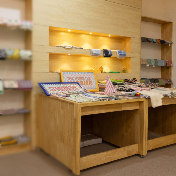 A curated display of finished home textile products showcasing craftsmanship, quality fabrics, and contemporary designs, reflecting the commitment of Anubav Fabrics, Karur to premium textile manufacturing