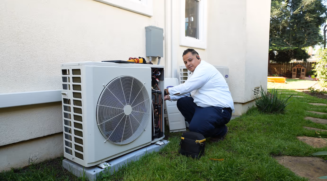 employee with outside ac unit