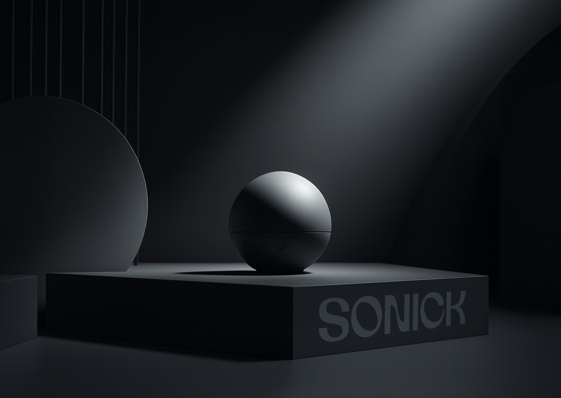 Altavoz esférico negro Sonick sobre un pedestal oscuro.