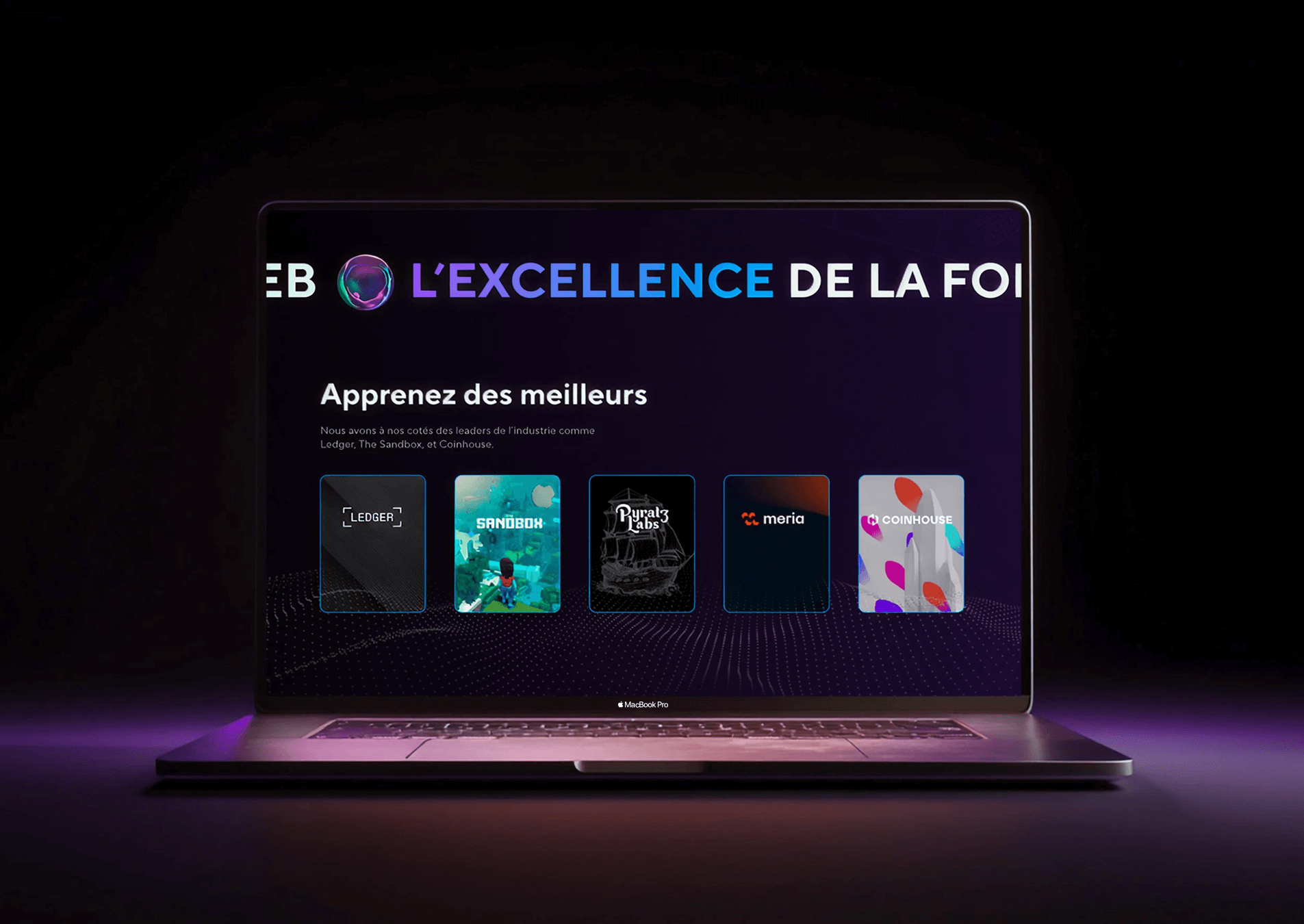 Blockchain Business School website displayed on a laptop with purple lighting