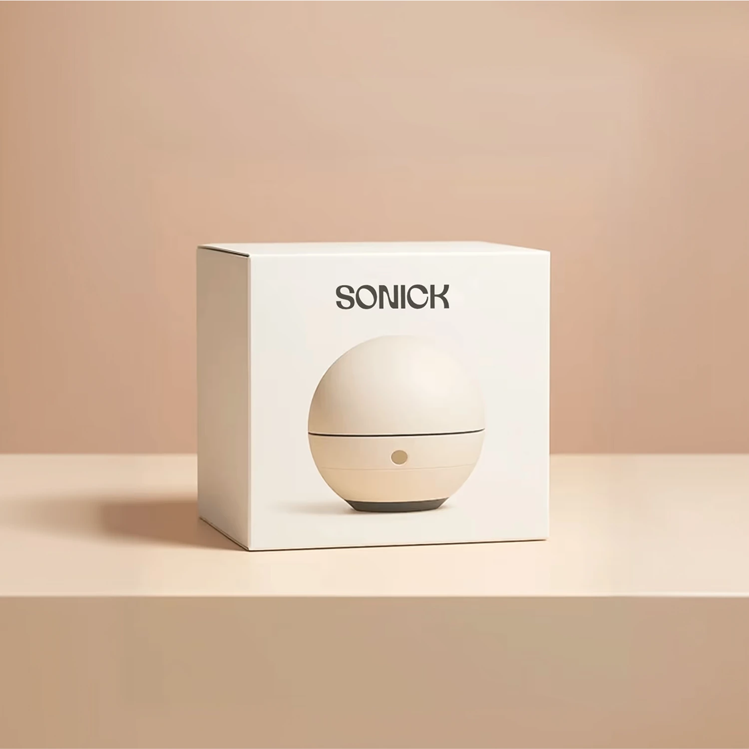 Cream Sonick box illustrated with the spherical speaker against a beige background.