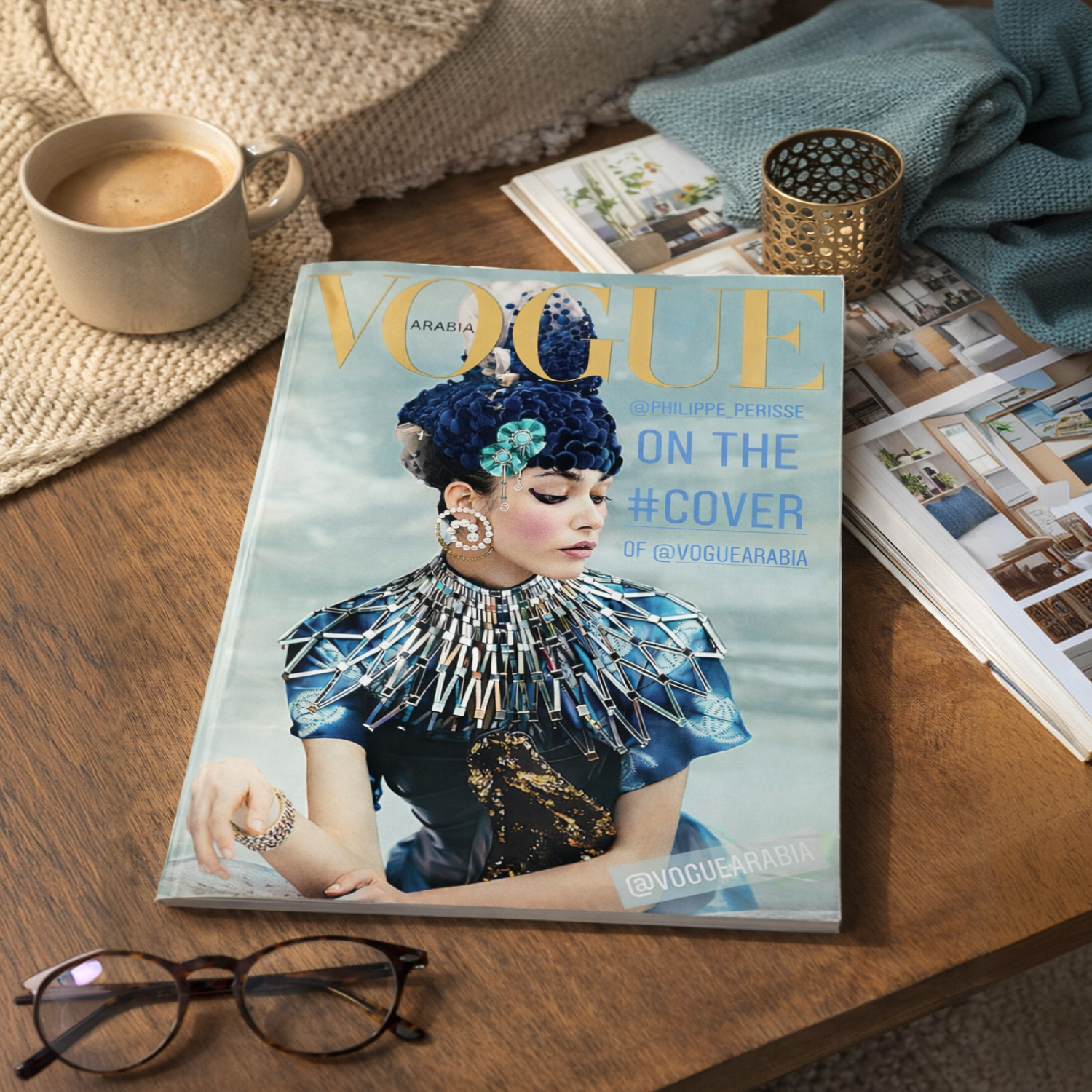 Vogue Arabia magazine on a table, with the Cleo necklace worn on the cover.