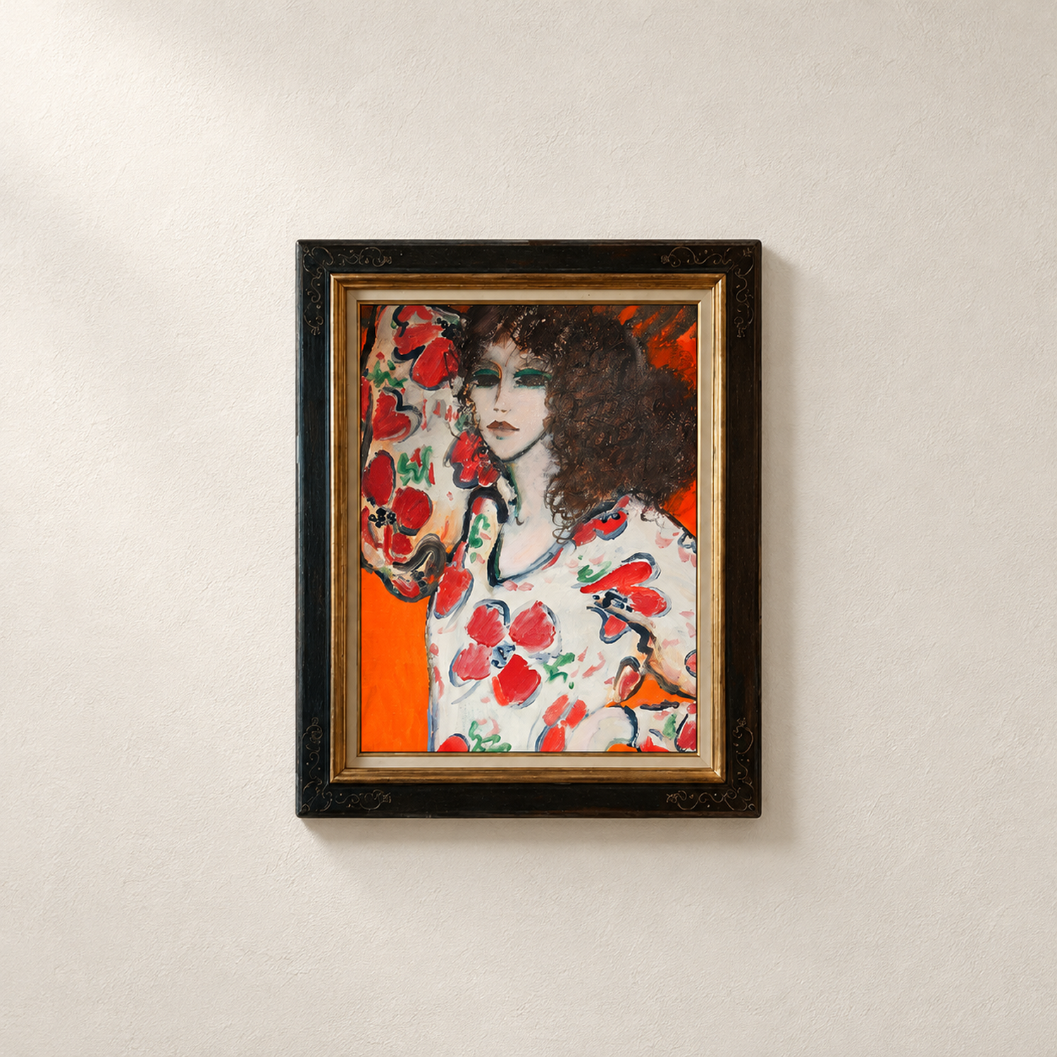 Framed portrait of a woman with dark curly hair and a red floral garment, from Portraits by Jean-Pierre Cassigneul x Lezar.