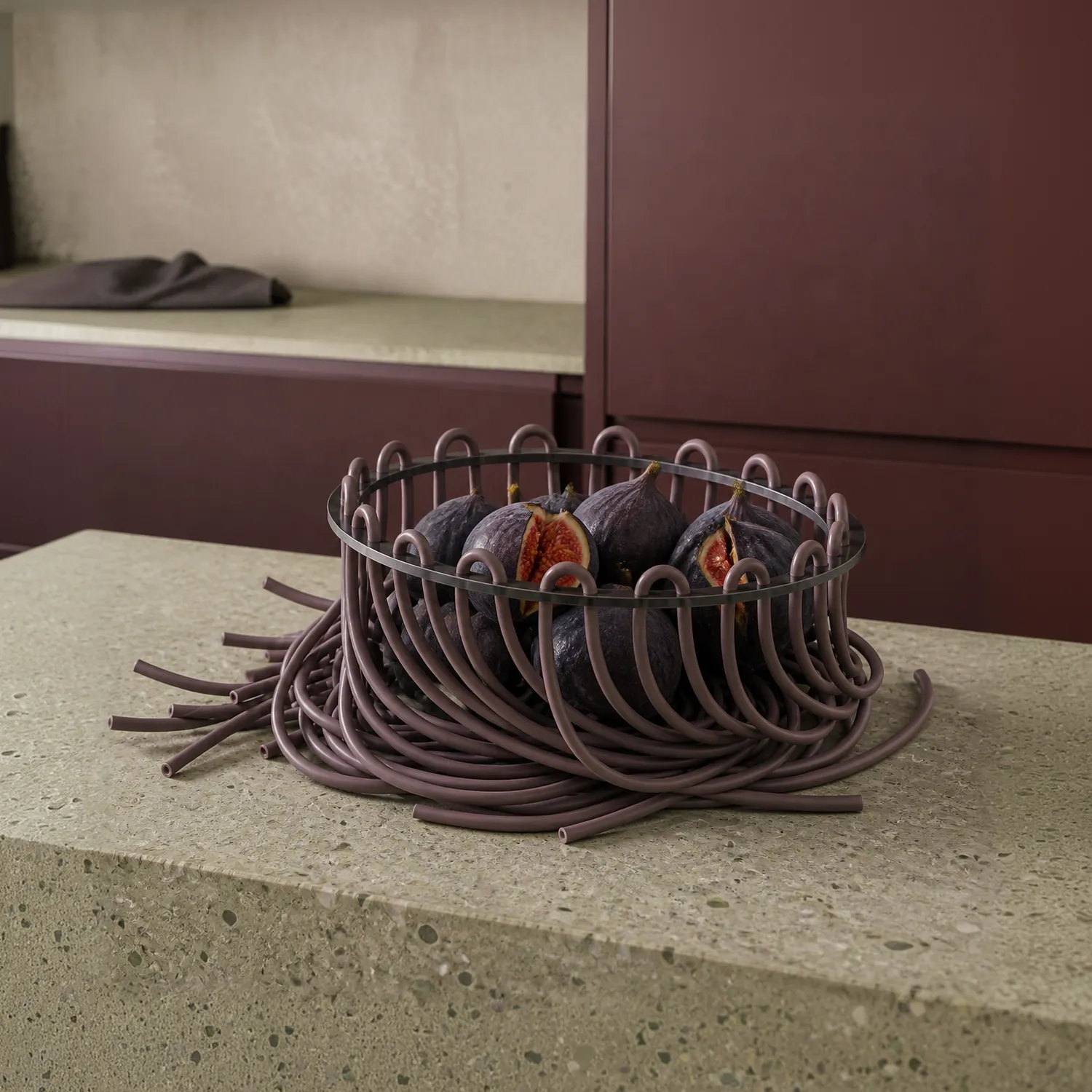 Mauve Lace fruit bowl holding figs in a burgundy kitchen.